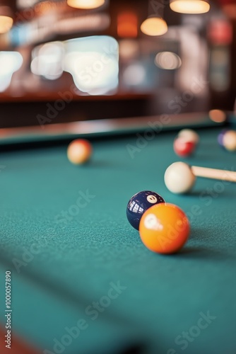 A focused shot of a billiard table with balls ready for a game in a lively ba...