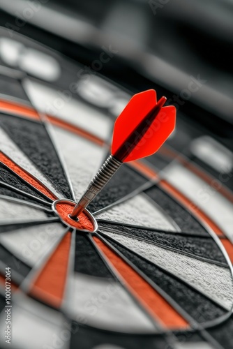 Red dart striking the bullseye on a dartboard in a game setting