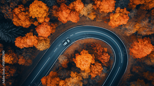 Aerial view of car traveling on a curvy road through autumn forest, fall foliage from above, scenic journey in nature, beautiful landscape with orange and yellow leaves, top drone shot . Generative AI