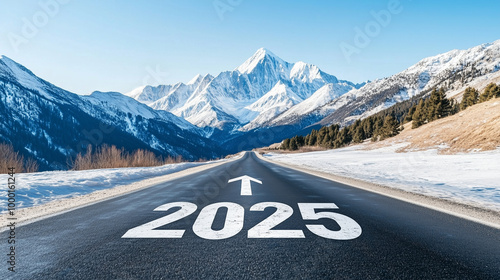 A mountain road with snow-capped peaks in the distance, the year 