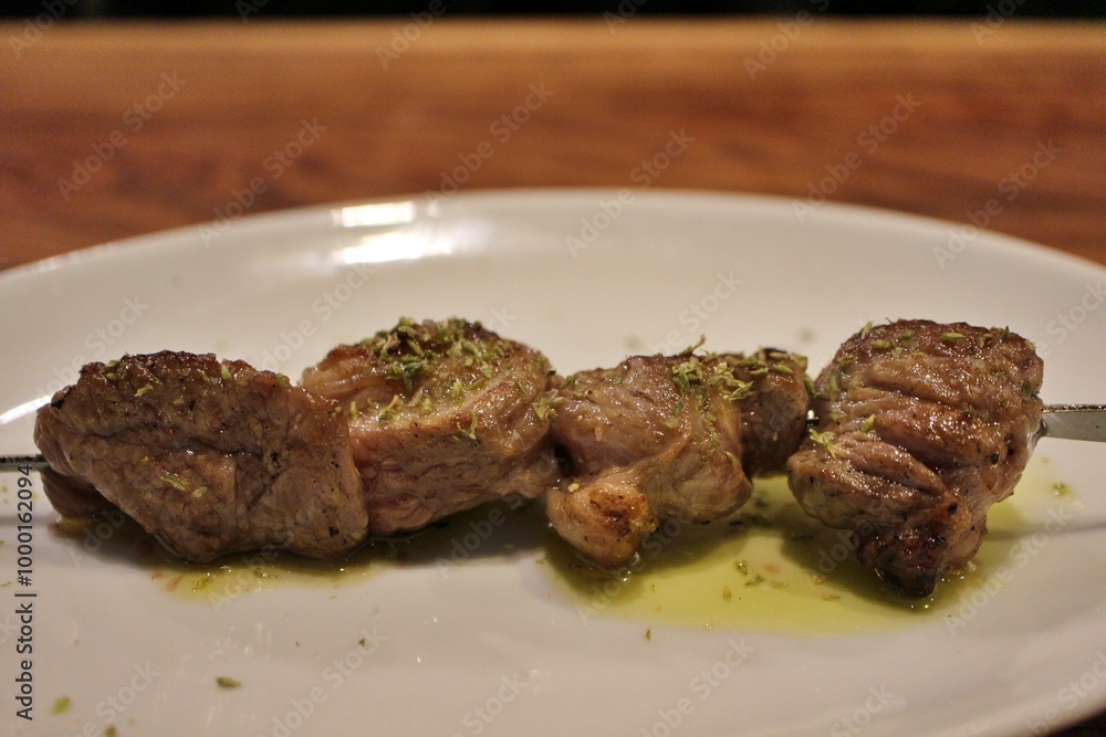 Italian cuisine: spiedino di agnello (grilled lamb skewer) Italian cuisine: spiedino di agnello (grilled lamb skewer)