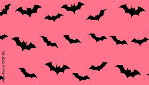 A bat pattern against a pink background, creating a festive Halloween vibe.