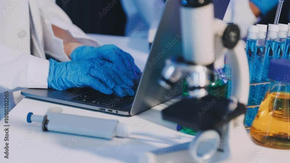 Medical development research laboratory, chemist or science scientist student hand in glove, drop water into pipette for test analysis liquid sample in clinic lab. Microbiology, analysing for medicine