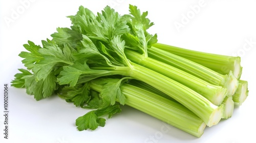 Fresh bunch of green celery stalks with leaves on white background