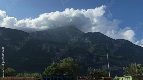 Clouds on the mountain peak in time-lapse