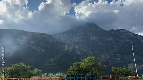 Clouds on the mountain peak in time-lapse