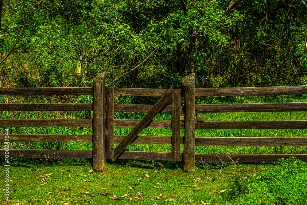 Fences and rustic buildings in the countryside Fences and rustic buildings in the countryside