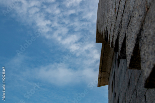 Stone stairs built on a gray granite wall Texture concept