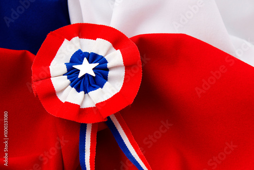 Fotografía Rosette with the colors of the chilean flag