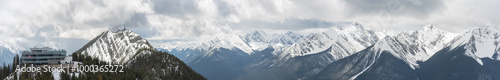 Spring time views above Banff at the gondola with incredible panoramic views of snow capped mountains in the Canadian Rockies. 