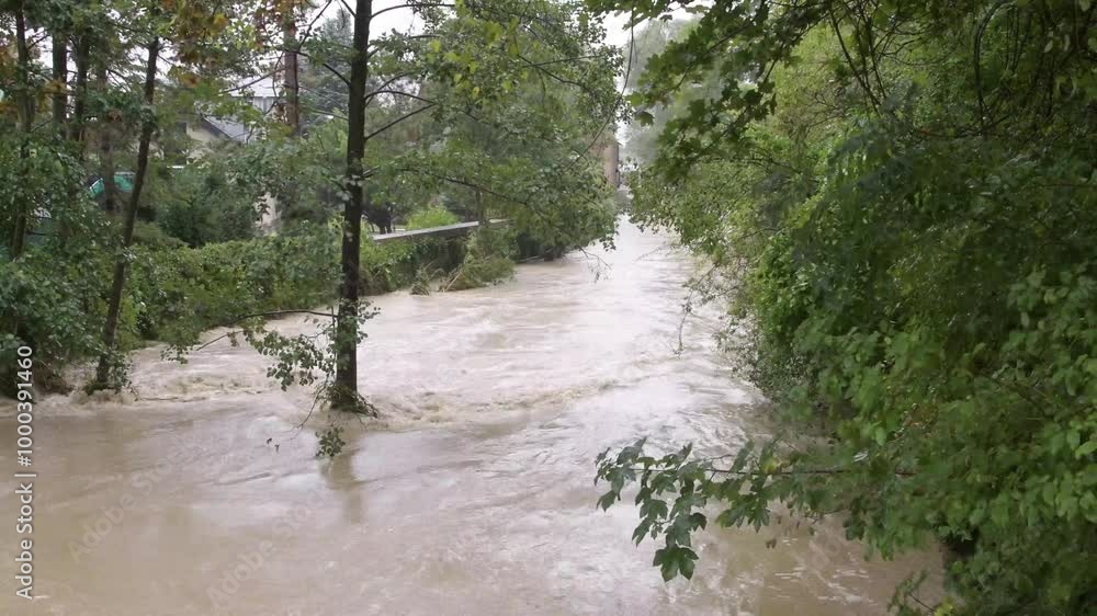 the overflow of the city river during flooding aft the overflow of the city river during flooding aft