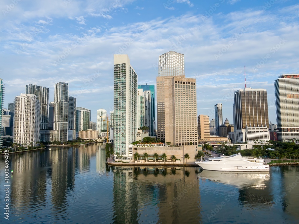 Downtown city skyline and calm ocean waterfront of Miami at sunrise, Florida, United States. Downtown city skyline and calm ocean waterfront of Miami at sunrise, Florida, United States.