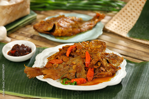 Stewed Tilapia Fish, Pindang Ikan Nila photo