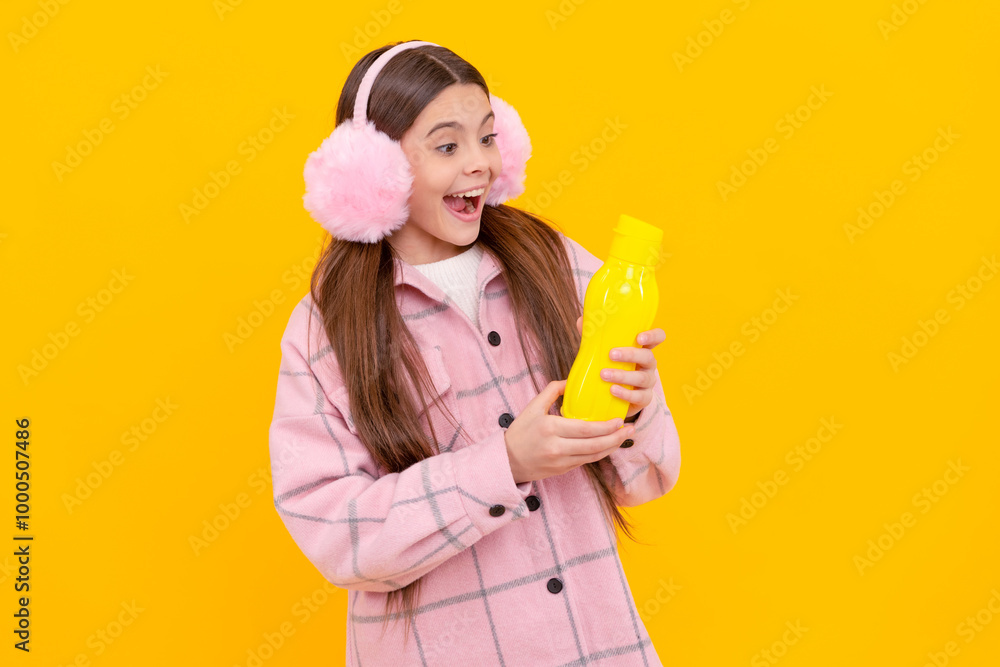 Excitement in a bottle. Excited girl hold plastic bottle. Beverage product. Bottled beverage Excitement in a bottle. Excited girl hold plastic bottle. Beverage product. Bottled beverage