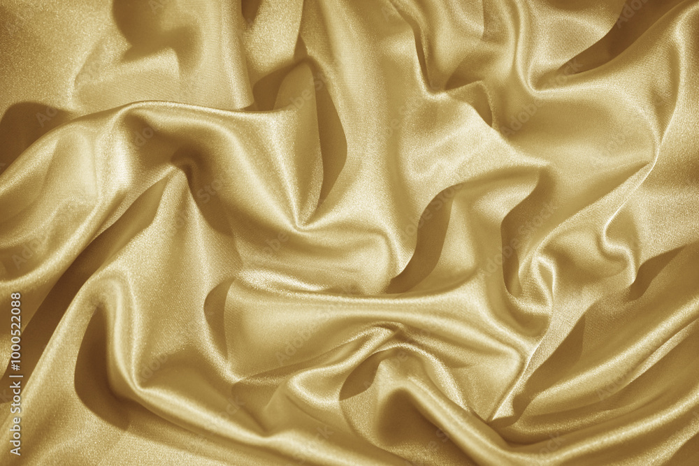 Dusty gold color abstract background. Light pastel soft pale yellow silk satin fabric. Golden luxury elegant beauty premium rich. Shiny glitter shimmer. Drapery. Christmas birthday. Design.