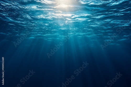 Sunlight Beams Through Deep Blue Ocean