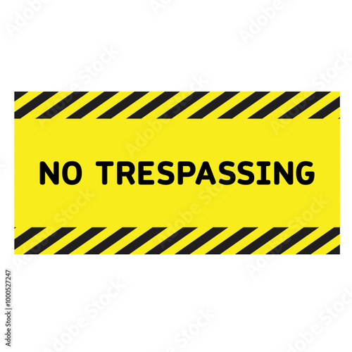 No trespassing sign. Yellow sign no trespassing. Warning sign.