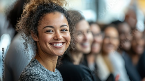 Happy Woman with Curly Hair Smiling in a Crowd
