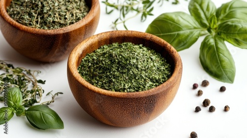 A display of herbs in wooden bowls, showcasing dried thyme and basil for culinary use.