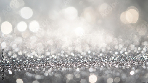 Glittering Abstract Bokeh Background with Soft Light. Close-up of a shimmering surface with bokeh lights, creating a dreamy and festive abstract background.