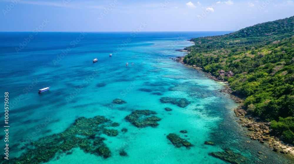 An aerial view of Koh Larns stunning coral reef just offshore, perfect for snorkeling and diving in clear blue waters. An aerial view of Koh Larns stunning coral reef just offshore, perfect for snorkeling and diving in clear blue waters.