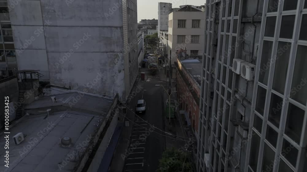Drone flies down narrow alley toward Praça XV de Novembro in Manaus, Amazonas, Brazil Drone flies down narrow alley toward Praça XV de Novembro in Manaus, Amazonas, Brazil