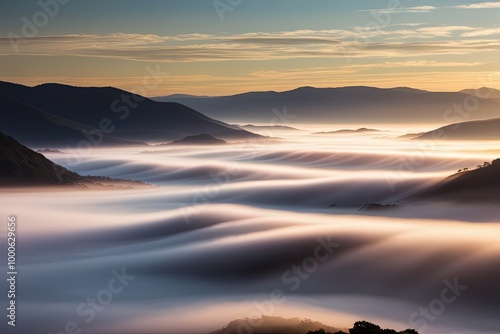Serene Mountain Landscape with Misty Fog Warm Sunrise Light and Stunning Sunlight Patterns