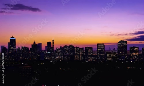 Wallpaper Mural The sky changes hues during sunset in this time-lapse, while city lights begin to twinkle into the night Torontodigital.ca