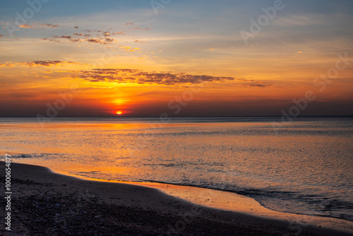 Obraz na płótnie Sandy beach with pebbles of Baltic Sea on Curonian Spit at sunset. Kaliningrad region. Russia w salonie