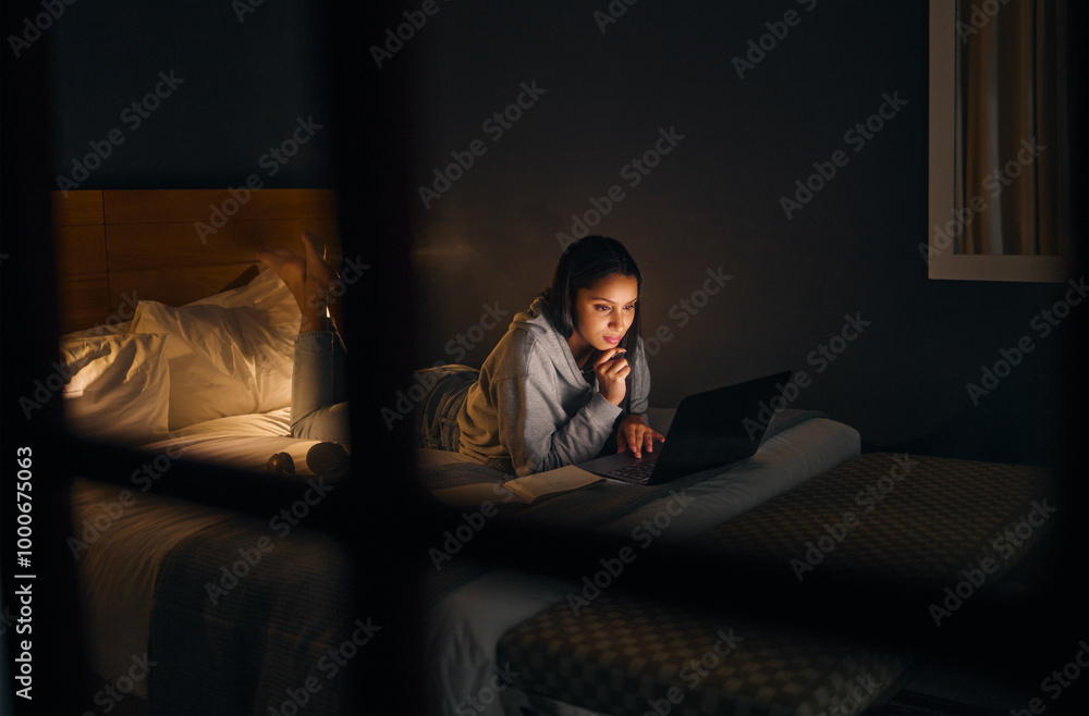 Woman, laptop and reading at night for study, learning and university in home on bed with online course. Student, technology and notebook in apartment for college exam, education and research project Woman, laptop and reading at night for study, learning and university in home on bed with online course. Student, technology and notebook in apartment for college exam, education and research project