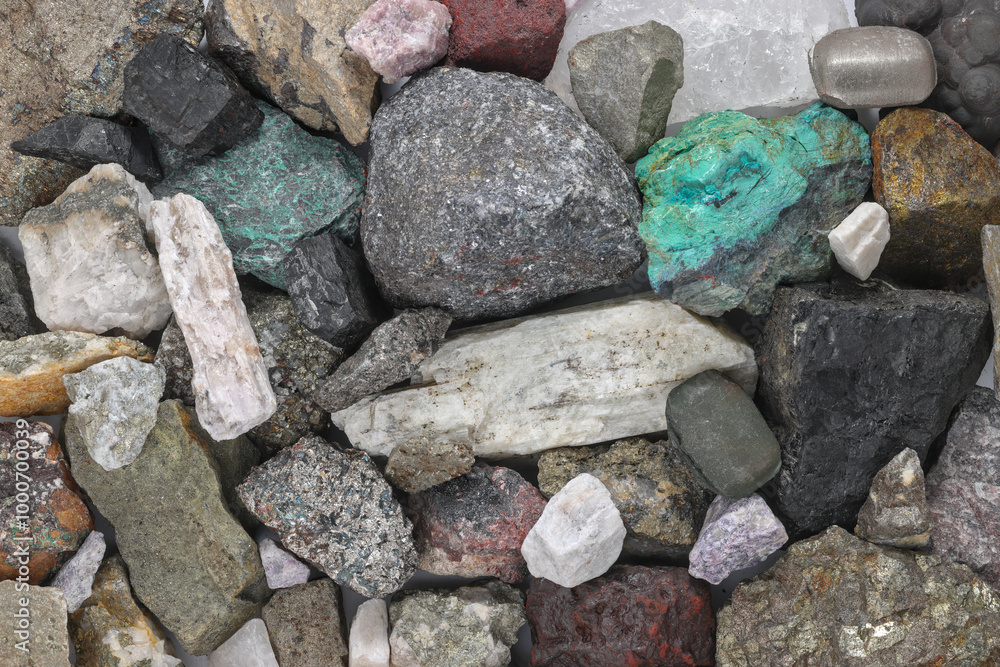 Mixture, variety of critical minerals, raw materials. Required for modern technology, such as solar panels, semiconductors, wind turbines, batteries, transportation. Mine, mining, background concept. Mixture, variety of critical minerals, raw materials. Required for modern technology, such as solar panels, semiconductors, wind turbines, batteries, transportation. Mine, mining, background concept.