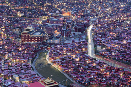 Night view of Five Science Buddhist Academy (Serta Larung Gar Buddhist Academy, Wuming Buddhist Academy) , in Larung Valley, Seda County, Garze Tibetan Autonomous Prefecture, Sichuan , China. photo