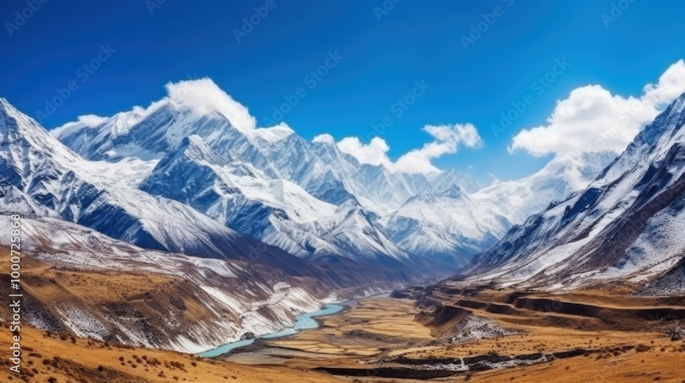 Fototapeta premium Stunning panoramic view of the Himalayas with snow-capped mountains, a blue sky, and a winding river through the valley, epitomizing natural beauty and grandeur.