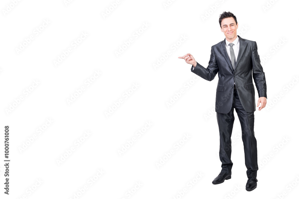 Smiling man pointing aside in studio. White background. Smiling man pointing aside in studio. White background.