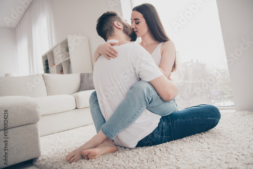 Photo of pretty passionate lady guy wear casual looks kissing having rest together indoors room home house