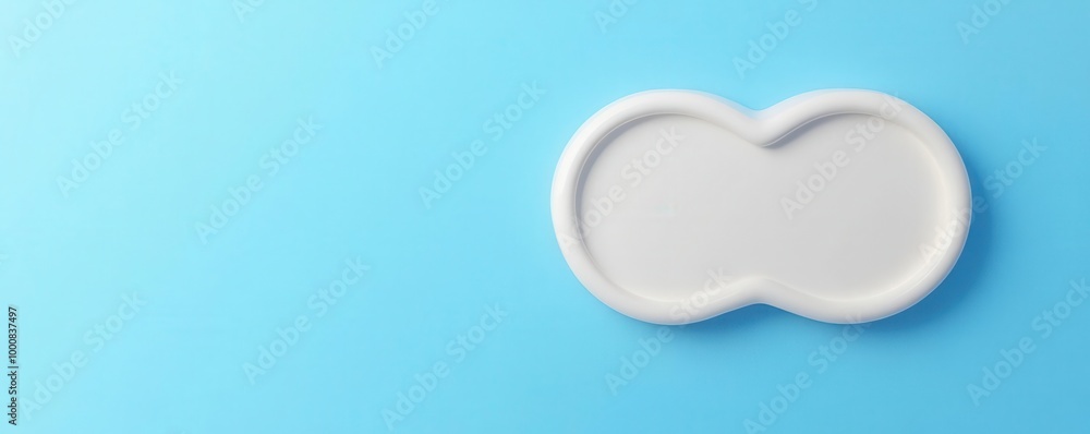 Empty white plate on a blue background, minimalist design. Empty white plate on a blue background, minimalist design.