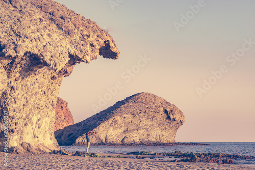 People walk on Monsul beach, Park Cabo de Gata, Spain