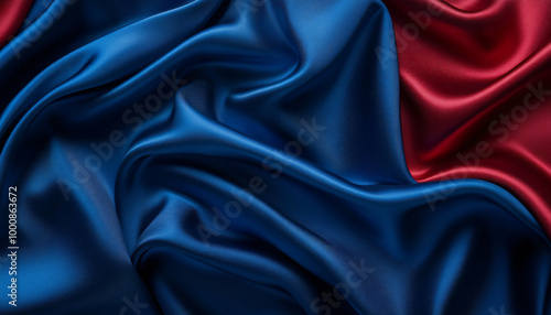 Close-up of flowing, luxurious silk fabric in rich colors like deep red or royal blue, creating a smooth and elegant texture