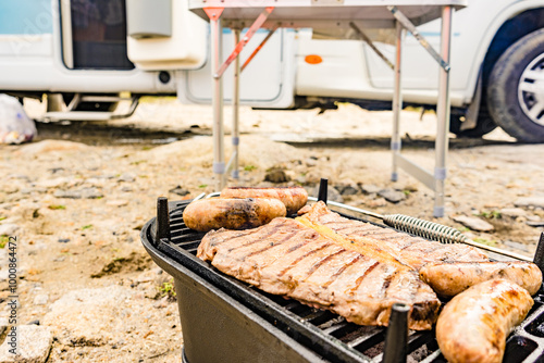 Grilled meat on barbecue grill