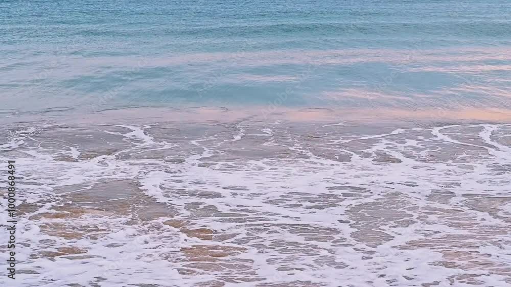 Sea waves on a sandy beach on shore on coastline in summer. Slow motion Sea waves on a sandy beach on shore on coastline in summer. Slow motion