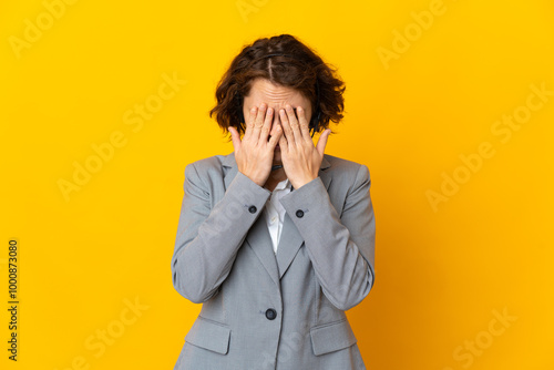 Young English woman isolated on yellow background with tired and sick expression