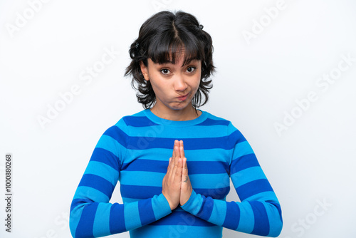 Quadro em tela Young Argentinian woman isolated on white background keeps palm together
