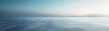 Empty Concrete Expanse Under Serene Blue Sky 
