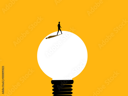 Creative, Wisdom. Businessman walking on light bulb