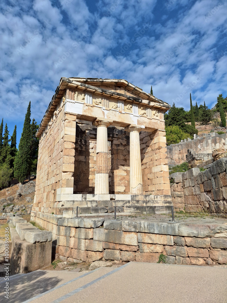 Fototapeta premium Ruins of an ancient greek temple at Delphi, Greece., at the Mount Parnassus. Delphi is famous by the oracle at the sanctuary dedicated to Apollo.