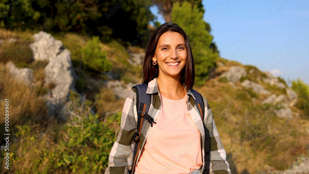 Beautiful, young woman enjoying hiking on the mountain Beautiful, young woman enjoying hiking on the mountain
