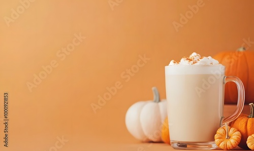 a glass of latte with big pumpkins and cut punpkins , Generative AI  photo