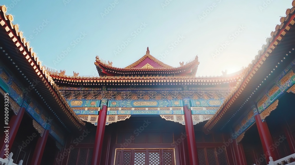 A low angle view of a traditional Chinese temple with a bright blue sky. A low angle view of a traditional Chinese temple with a bright blue sky.