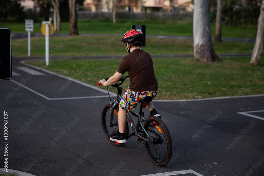 child learning road safety at a council bike track child learning road safety at a council bike track