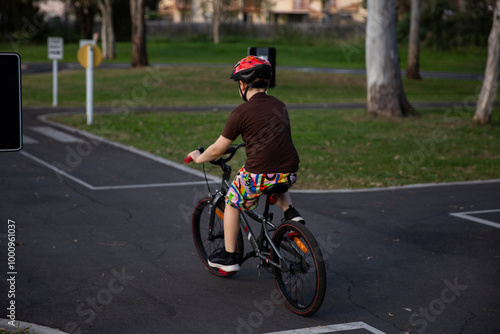 child learning road safety at a council bike track